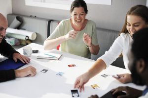 Laughing in a business meeting