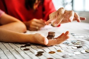 Two people counting money